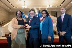 House Speaker Mike Johnson, R-La., center, presents Congressional Gold Medal honoring NASA mathematician Mary Jackson 9//18/24